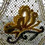 merletto fatto a mano che raffigura una faarfalla